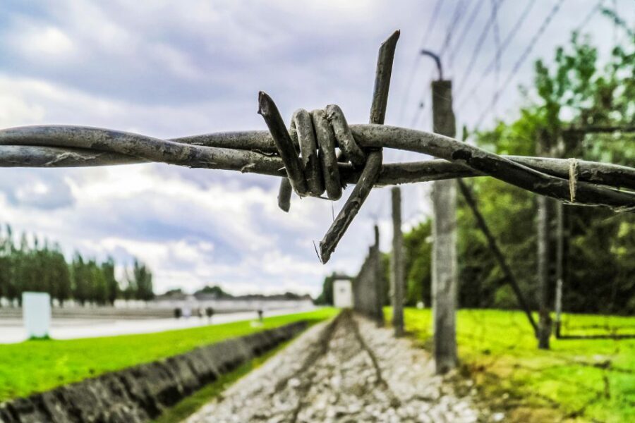 From Munich: Dachau Memorial Site Half-Day Trip - The guided walk through surviving camp buildings