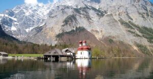 From Munich: Königsee Day Tour by Van - Königssee by boat: echoes, the peninsula, and Sleeping Witch views
