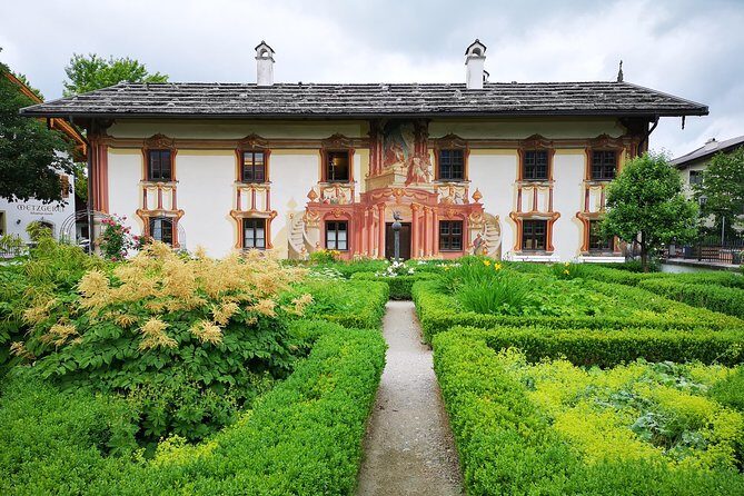 Munich private Car & Walking Tour incl. BMW World & River Surfers - Mad King Ludwig’s World: Linderhof Castle Gardens Option