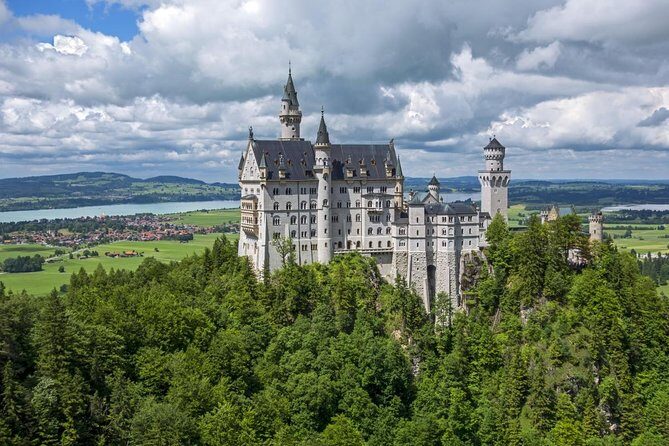 MY<em>GUiDE The King's GREATEST PALACES Neuschwanstein & HERRENCHIEMSEE from Munich – Key highlights you’ll actually feel’ /></p>
<ul>
<li><strong>Guaranteed skip-the-line tickets</strong> for Neuschwanstein included in the tour price</li>
<li><strong>Private comfort</strong> in an A/C minivan with scenic route driving from Munich</li>
<li><strong>Guided palace interiors</strong>: 35 minutes at Neuschwanstein and about 35 minutes at Herrenchiemsee</li>
<li><strong>Marienbrücke viewpoint options</strong>: shuttle bus or a long uphill hike (and snow/ice limits)</li>
<li><strong>More Ludwig than just castles</strong>: Rottenbuch church and Lake Starnberg, including the Roseninsel stories</li>
<li><strong>Local guide with humor and context</strong>, including Stefan, who keeps the day moving and understandable</li>
</ul>
<h2>The big picture: two Ludwig II palaces plus real Bavarian stops</h2>
<p><img width="670" height="446" decoding="async" src=