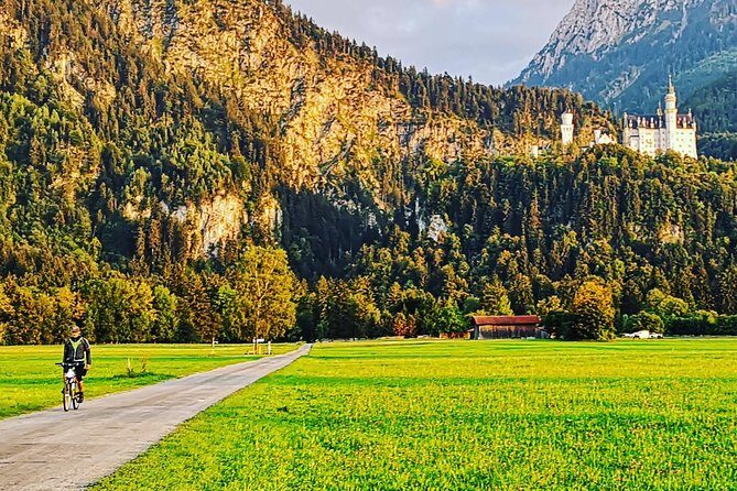 Neuschwanstein Castle by Bus Incl. Bike Ride or Hohenschwangau - Schwangau to Schwansee: a lake stop that’s optional-swish friendly