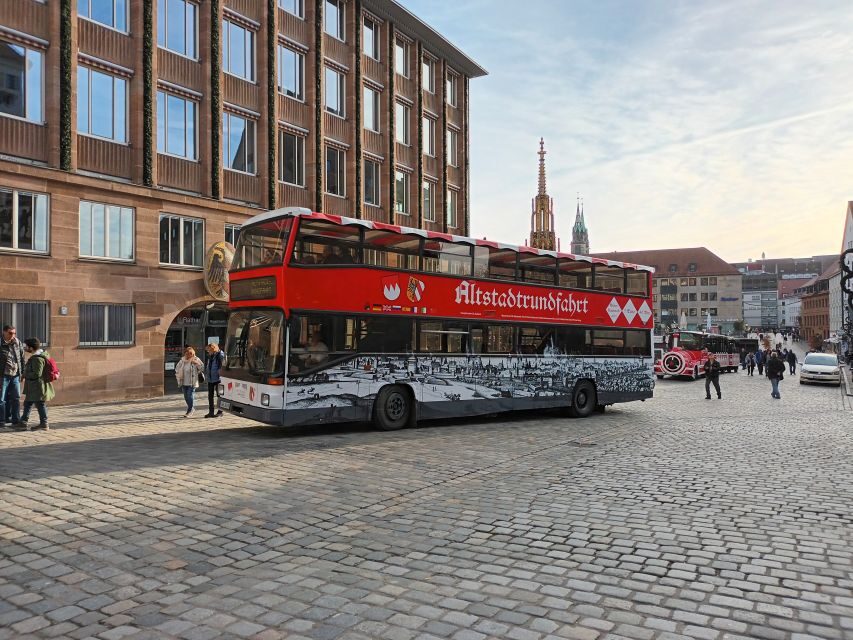 Nuremberg: Old Town Guided Tour By Bus - Audio guide reality: languages, headphones, and avoiding sound overlap