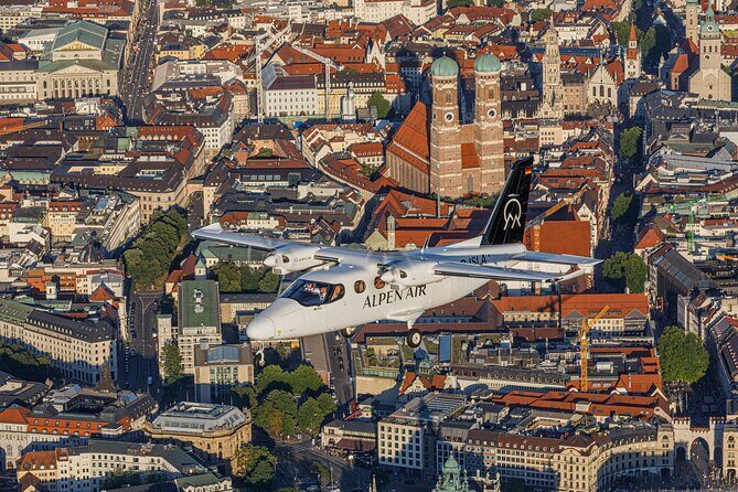 Sightseeing flight Zugspitze Neuschwanstein Castle Alps Munich Augsburg - Chiemsee and Herrenchiemsee: lake views with an Alpine backdrop