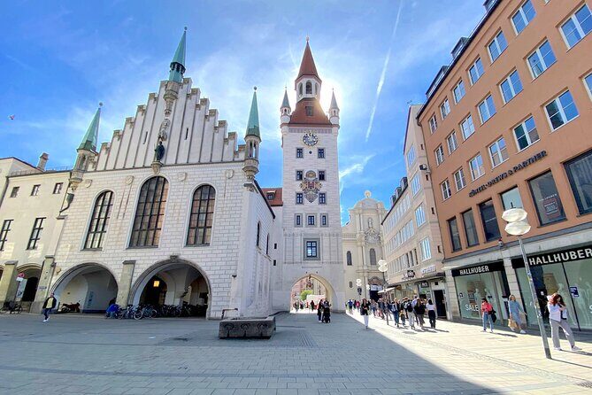 Ten Munich Old town Sights in a Private Express Walking Tour - St. Peter’s Church: eight clocks, a tiara ritual, and a cannonball